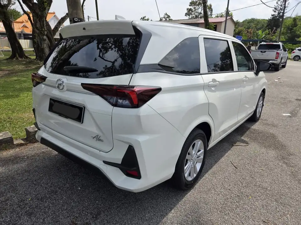 Perodua Alza (New), rear three-quarter view
