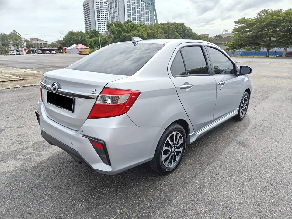 Perodua Bezza, rear three-quarter view